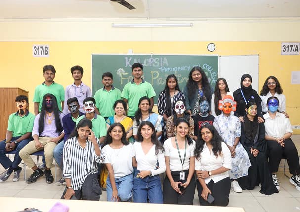 Students with face paint at the Kalopsia face-painting event
